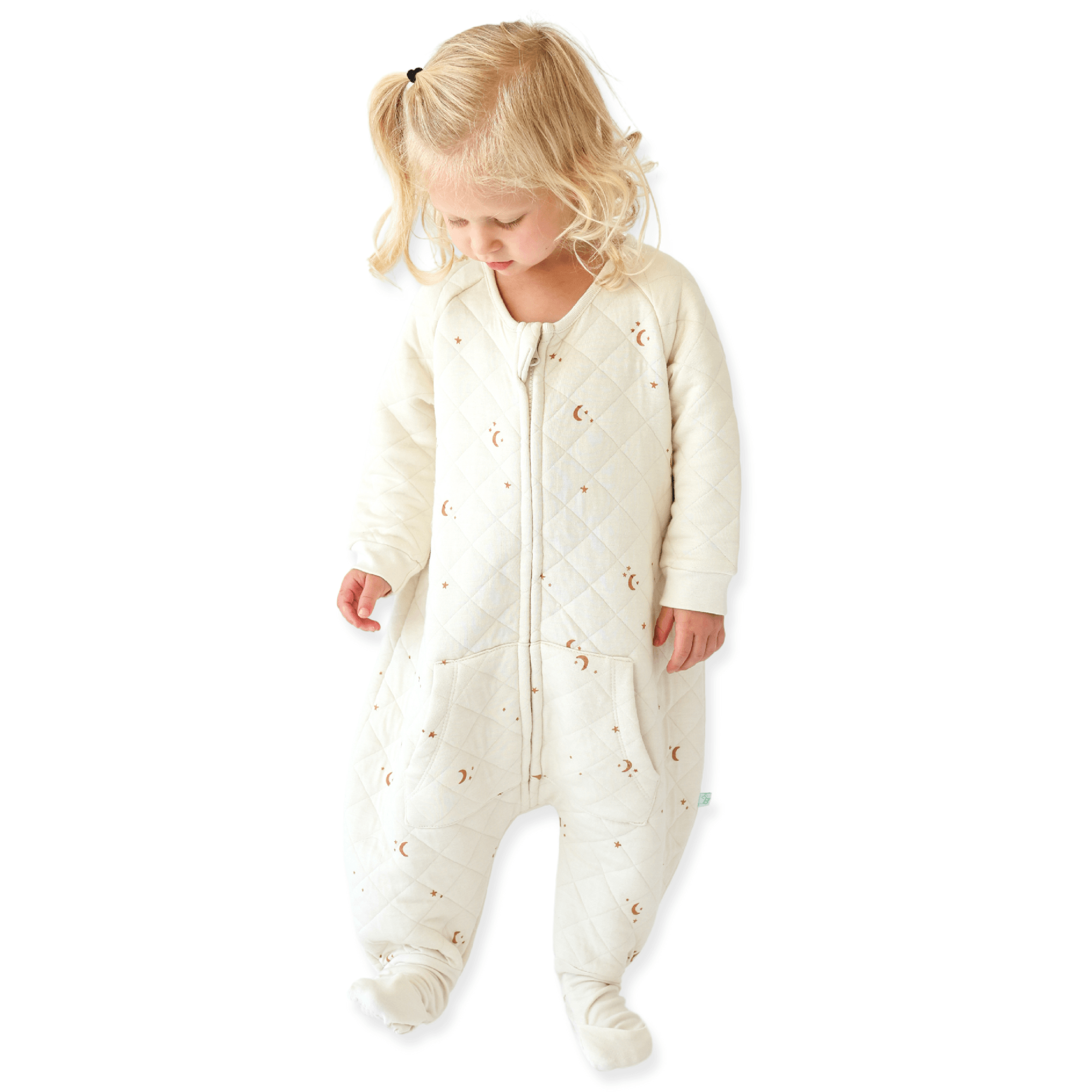 A baby standing up comfortably in a Tealbee Dreamsie, highlighting the perfect combination of warmth, coziness, and freedom of movement for a happy, restful sleep.