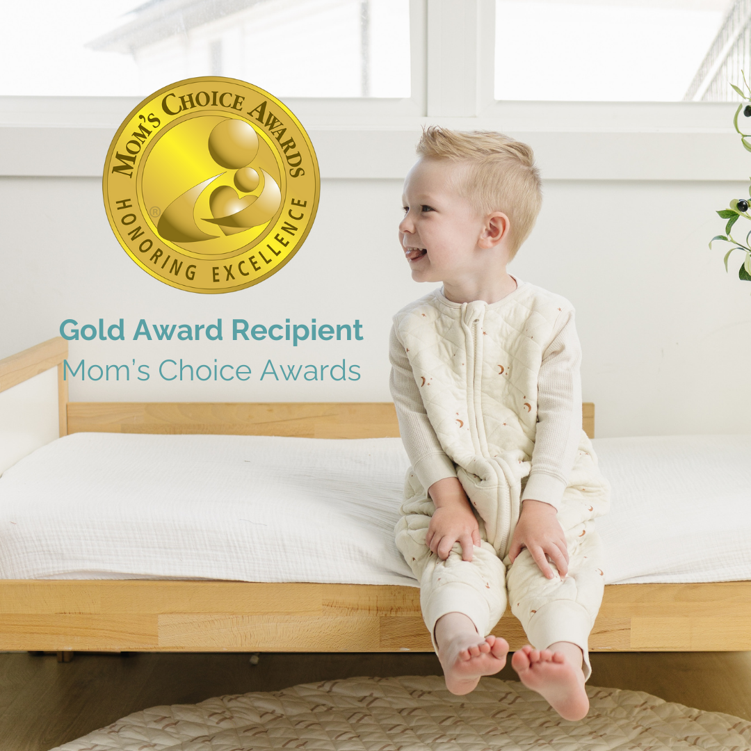 Tealbee Dreamsuit - Gold Award Recipient - The Tealbee Dreamsuit, honored with the Mom's Choice Awards Gold Award, renowned for its superior quality, comfort, and design, making it a top choice for babies and toddlers.