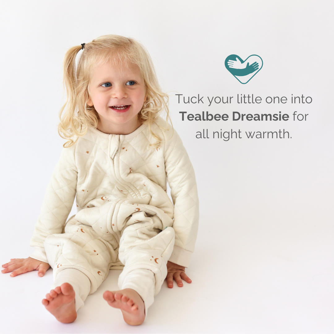 A snug and warm Dreamsie designed for toddlers, featuring soft fabric and a secure fit for comfortable sleep.