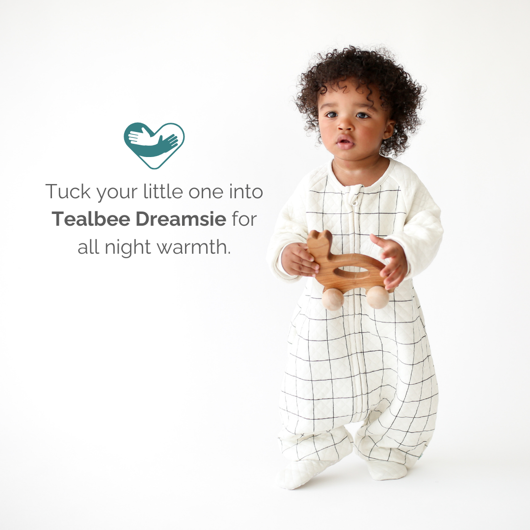 A snug and warm Dreamsie designed for toddlers, featuring soft fabric and a secure fit for comfortable sleep.