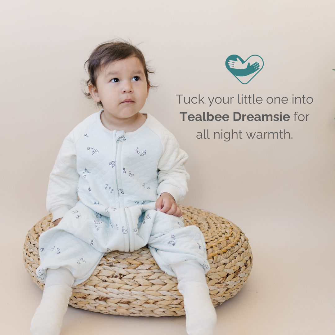 A snug and warm Dreamsie designed for toddlers, featuring soft fabric and a secure fit for comfortable sleep.